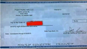 A picture of a check paid out from the company Project Payday