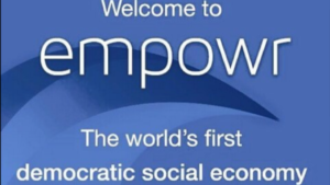 A blue and white screen shot that reads, Welcome to Empowr, the worlds first democratic social economy